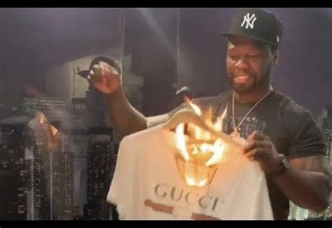 50 cent gucci burning